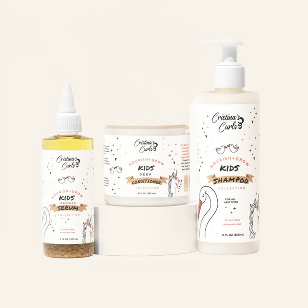 Nourish + Grow Starter Set: Kids Shampoo, Kids Deep Conditioner, Kids Scalp Serum on a cream background