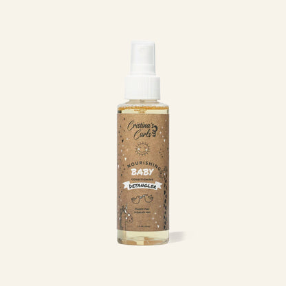 Nourishing Baby Detangler Spray on a cream background