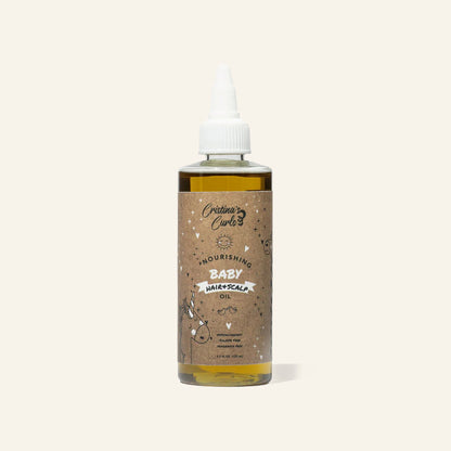 Nourishing Baby Hair and Scalp Oil on a cream background